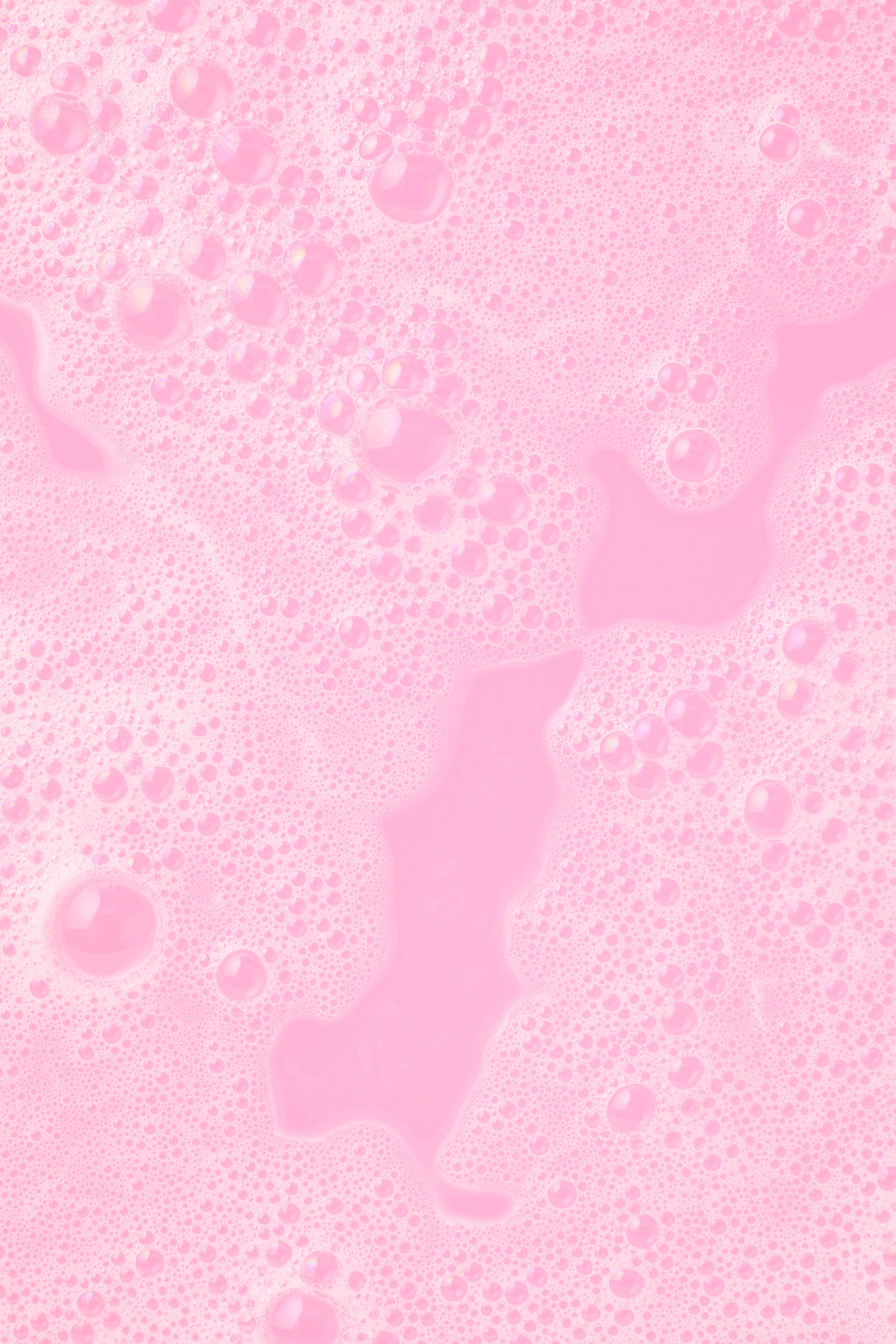 Pink bubbles on a pink background